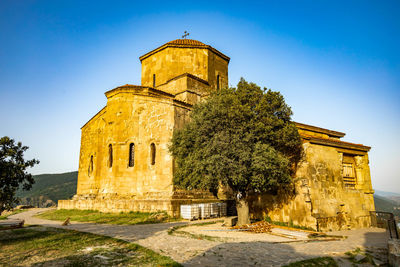 View of historical building against blue sky