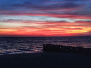 Scenic view of sea against sky at sunset