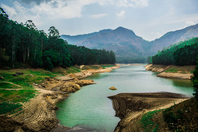 Scenic view of landscape and mountains against sky