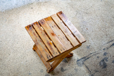 High angle view of chair on floor