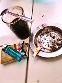 High angle view of coffee cup on table