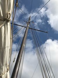 Low angle view of mast against sky