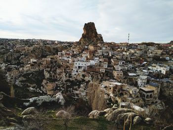 Aerial view of townscape against sky