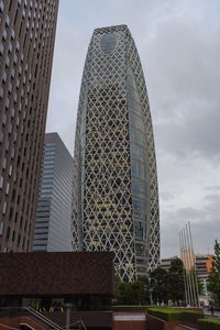 Low angle view of modern buildings against sky