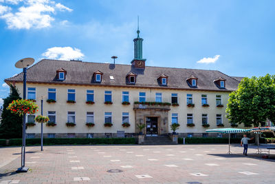 Building against cloudy sky