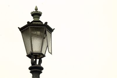 Low angle view of street light against clear sky