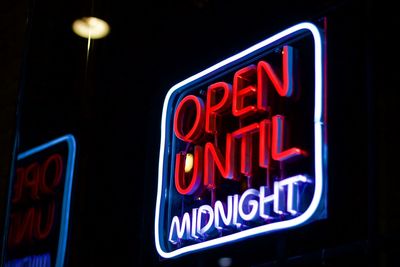 Close-up of illuminated information sign in store