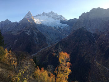 Scenic view of mountains against sky during autumn