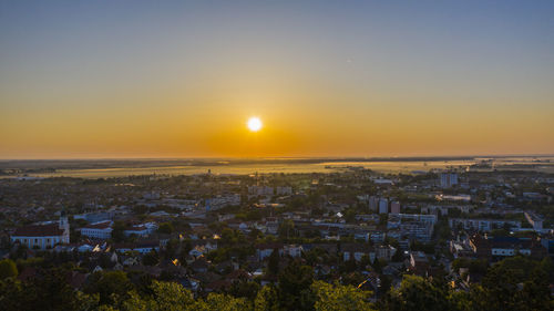 High angle view of townscape against sky during sunset