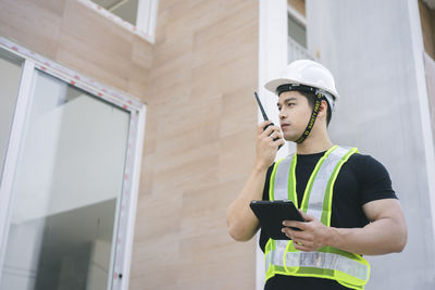 Young man using mobile phone