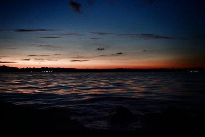 View of calm sea at sunset