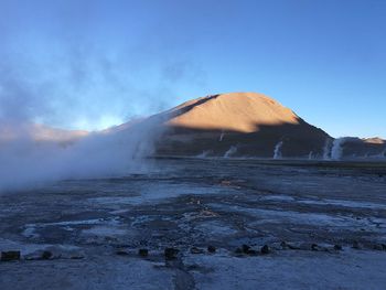 View of hot spring against sky