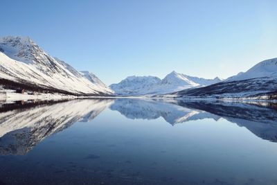 Scenic view of snowcapped mountains against sky