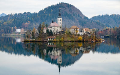 Reflection of santa maria church on lake bled