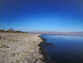 View of sea against blue sky