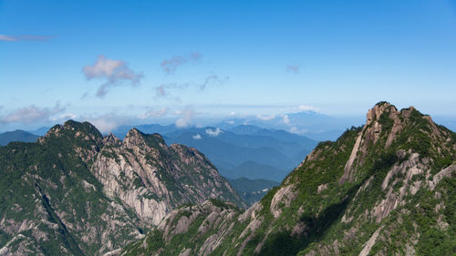 Panoramic view of rocky mountains against sky