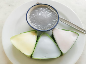 High angle view of egg in plate on table