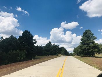 Empty road against sky