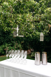 Close-up of drinking glasses on table