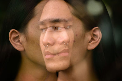 Multiple exposure of man looking away