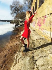 Full length of woman on water