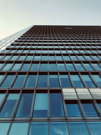 Low angle view of modern building against clear sky