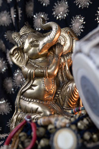 Close-up of buddha statue in temple