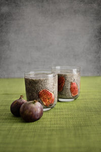 Close-up of fruits in jar on table