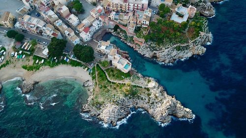 High angle view of town by sea