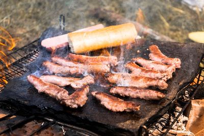 Close-up of meat on barbecue grill