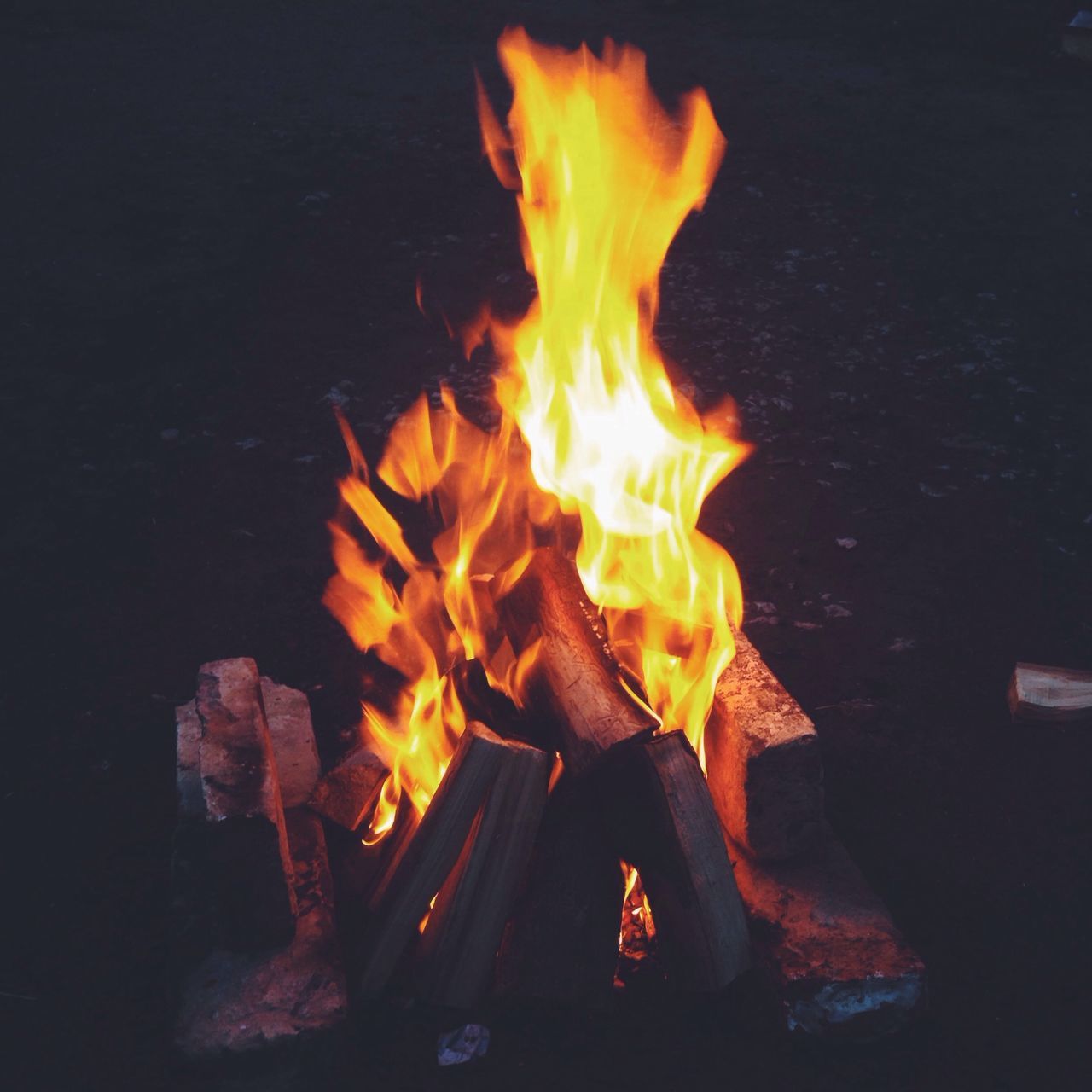 flame, burning, fire - natural phenomenon, heat - temperature, bonfire, firewood, fire, glowing, night, campfire, heat, orange color, motion, close-up, wood - material, fireplace, dark, fire pit, outdoors, no people