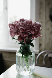 Close-up of flower vase on table