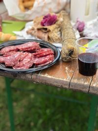 Food and drink on table at yard