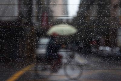 Close-up of wet window in rainy season
