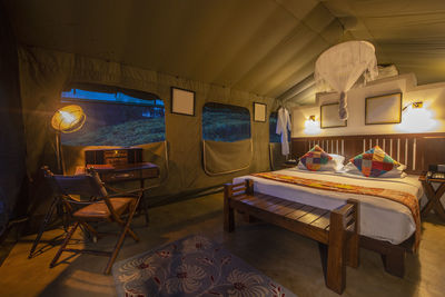 Bedroom inside of a luxury camp on the sri lankan highlands