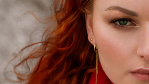 Close-up portrait of woman standing outdoors