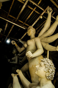 Low angle view of buddha statue in museum