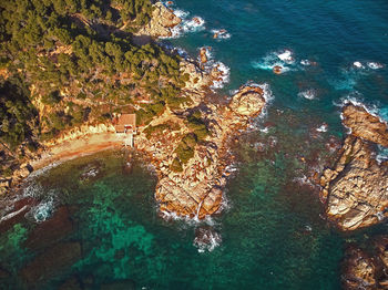 High angle view of rocks on beach