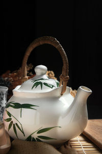 Rear view of couple sitting on table