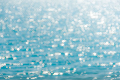 Close-up of bubbles against sea