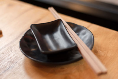 High angle view of black coffee on table