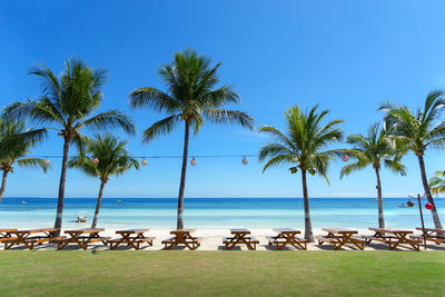 Scenic view of sea against clear blue sky