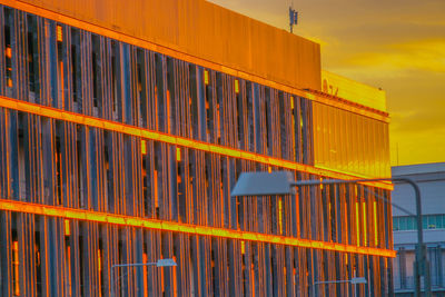 Low angle view of building against sky during sunset