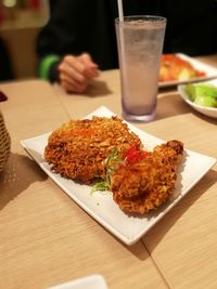 Close-up of food served on table