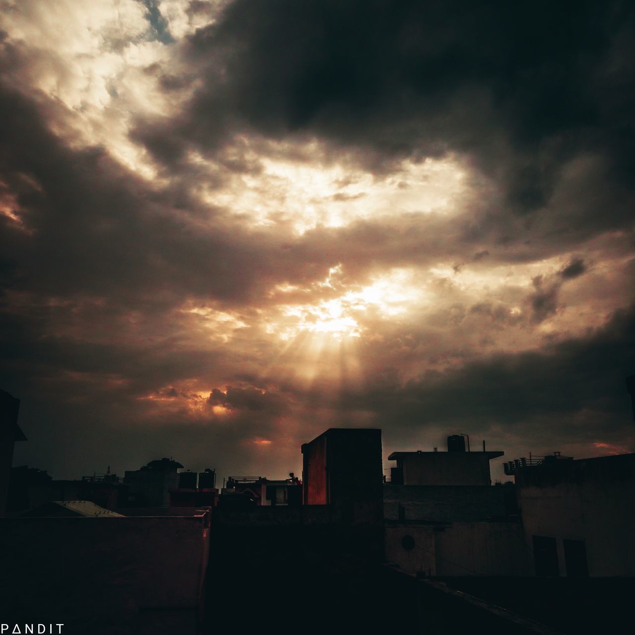 cloud - sky, architecture, sky, built structure, building exterior, building, city, silhouette, sunset, nature, no people, cityscape, overcast, dramatic sky, outdoors, residential district, sunlight, dusk, storm cloud, office building exterior, skyscraper, ominous