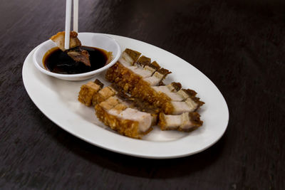 Close-up of food served on table