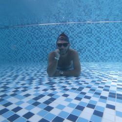 Portrait of man in swimming pool