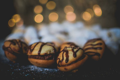 Moody picture of traditional christmas bakeries on a place with bokeh effect and cozy atmosphere.