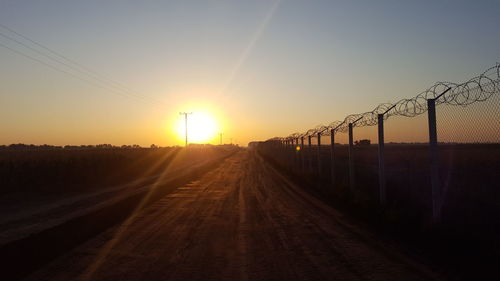 Sunset over railroad track