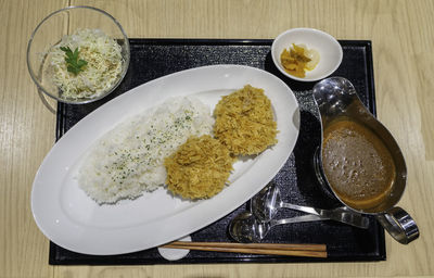 High angle view of breakfast served on table